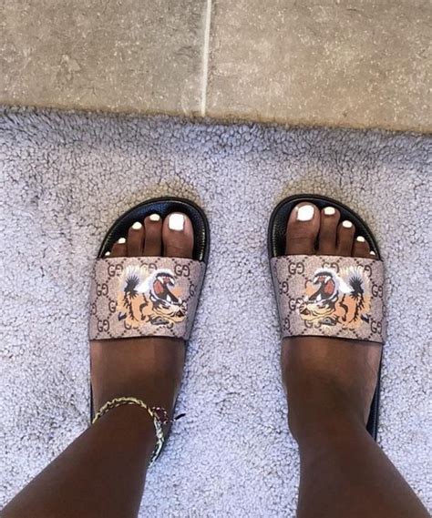 gucci slides lion